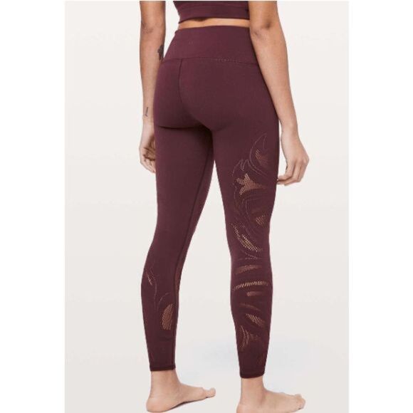 Lululemon size 12 burgundy Reveal tights/ leggings *FLAW* - Picture 2 of 9